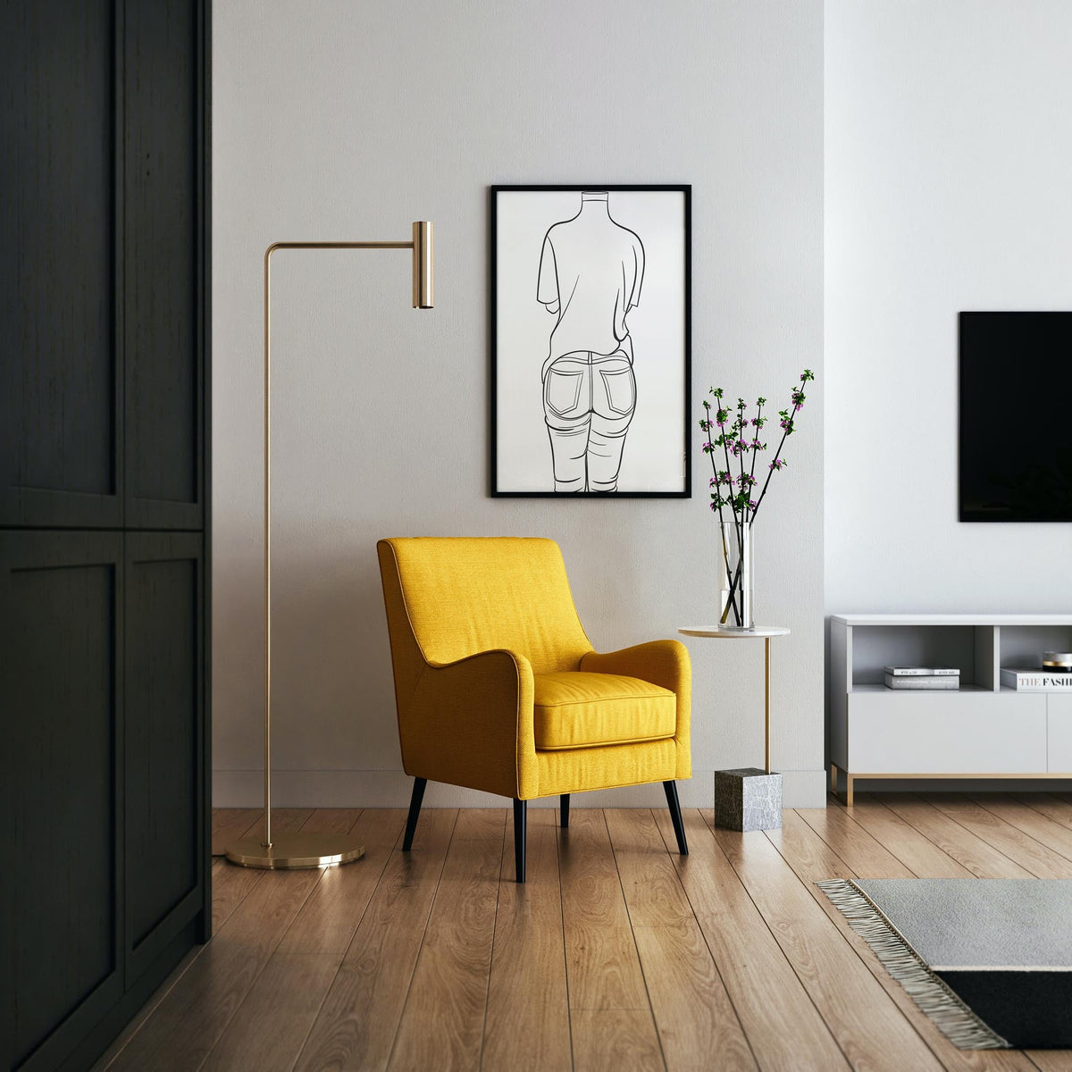 Yellow chair and lamp in a modern living room with denim line art on the wall.